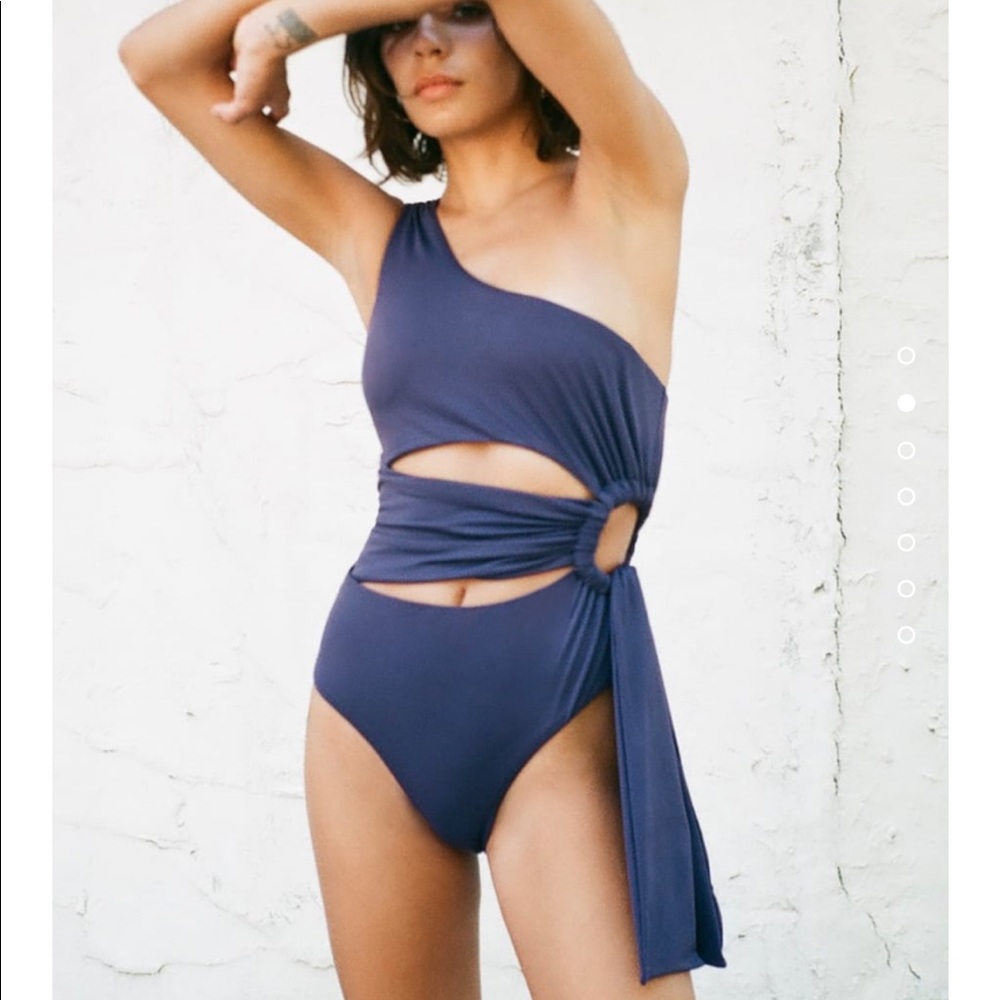 Asymmetric cut out swimsuit